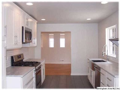 A view from the eat-in area of the kitchen to the 