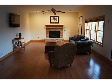 Den/Family/Great Room. The Family Room is Open to the Breakfast Room and Kitchen.  Ideal for Today s Lifestyle!