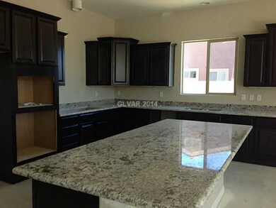 Kitchen. Gourmet kitchen features large granite is