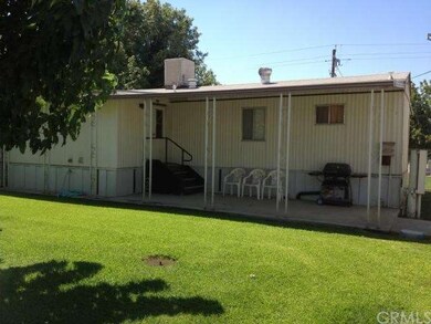 Back yard, patio, lawn has sprinklers