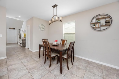 Dining area 7034 Emerald Spring Lp, New Port Richey, FL 34653 at Copperspring