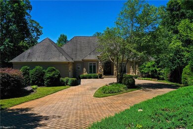 Front view with gorgeous circular paver driveway.  You feel like you have your very own private getaway!