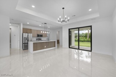 Kitchen featuring appliances with stainless steel