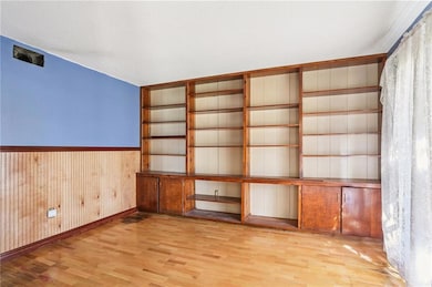 LIVING ROOM/ STUDY WITH BOOKCASES