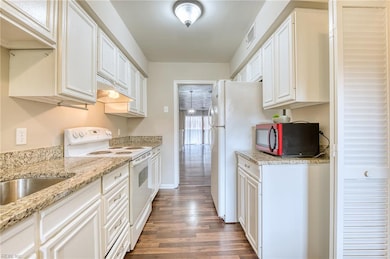 kitchen opens to dining area