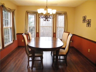 Dining room with beautiful lighting and view out t