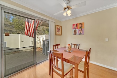 Enjoy indoor meals with this view of the private fenced patio with its easy to maintain vinyl fencing and views of the rolling hills or enjoy that morning cup of coffee outdoors.