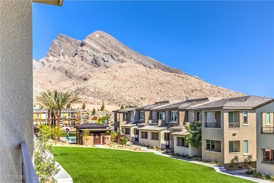 Mountain view featuring nearby suburban area