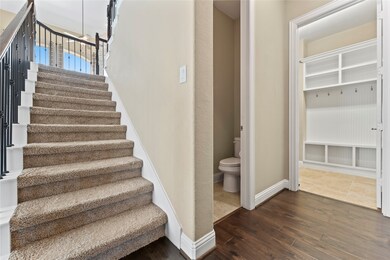 View of Half Bath and Laundry Room