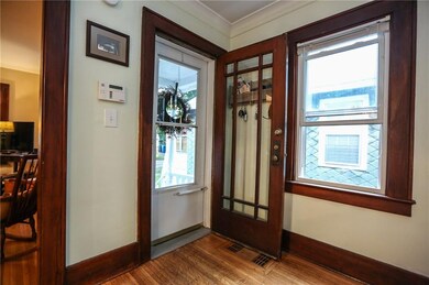 Main entrance into the home located on side porch 