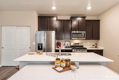 Open Galley Kitchen Layout, Large Island, Quarz, EnergySaver appliances. Large adjoining pantry. Enjoys NE-facing morning light.