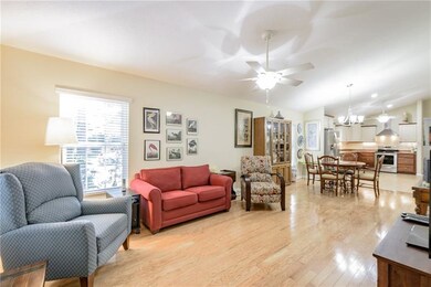 Living Room with Dining Area and Kitchen beyond