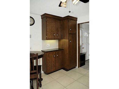 Kitchen. Additional storage in eating area.