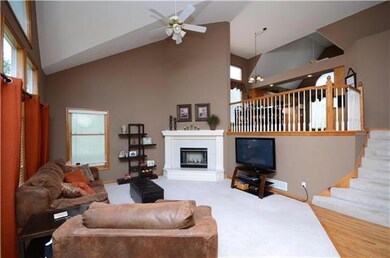 Large open living room with fireplace.