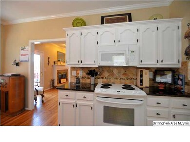 Tons of cabinet space in the cooking area. Microwa