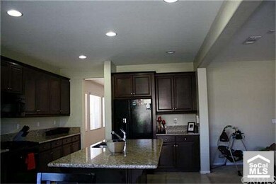 KITCHEN IS OPEN TO FAMILY ROOM
