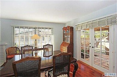 Formal Dining Room with French Doors leading out t