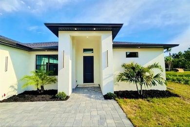 Doorway to property with stucco siding