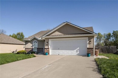 306 E Olive St, Raymore, MO 64083 - photo 4