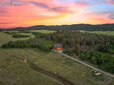 Aerial view at dusk featuring a mountain view and 