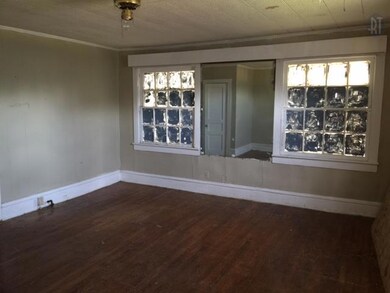 Downstairs Living Room with hardwood floors