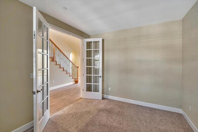 Den/library with french doors