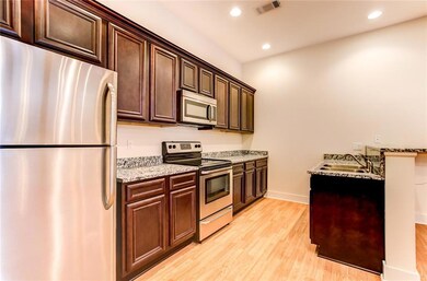 611 Julia St unit F, New Orleans, LA 70130 - photo 2