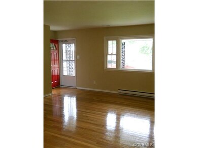 Living Room with Refinished Hardwood Floors
