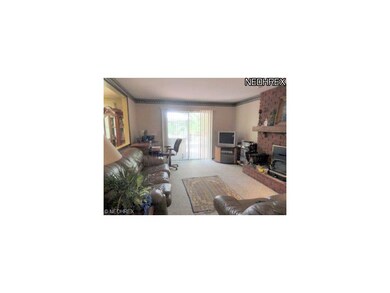 Cozy family room with access to large tiered-deck 