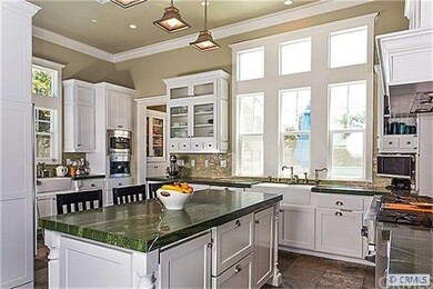 kitchen has 15 foot ceilings; laundry and a 3/4 ba