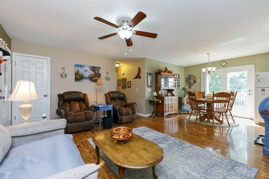 Another view of living room & dining area
