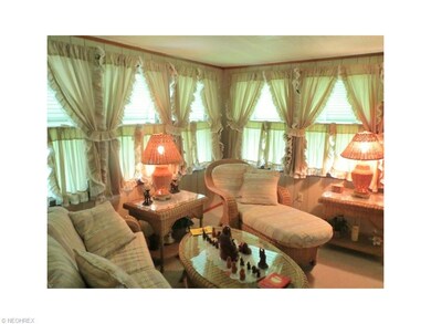 THREE SEASON SUN ROOM , GREAT ADDITION ADDING EXTRA LIVING SPACE