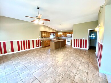 Entering the dining and kitchen from the living room