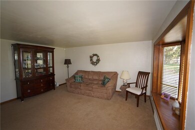 Living room has foyer nook w/coat closet & beautif