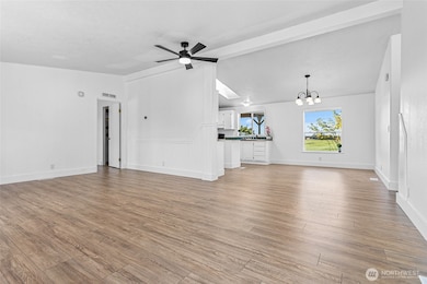 Large open liv room opens to dining and kitchen