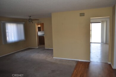 Living Room with view to Formal Dining Room