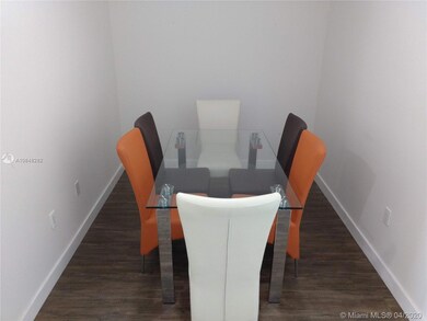 Den area used as formal dining room