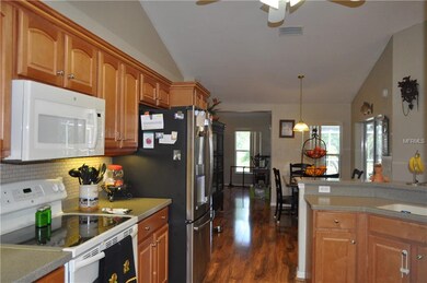 Kitchen looking into breakfast area and Great room