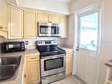 Easy access from the carport to the kitchen, you w