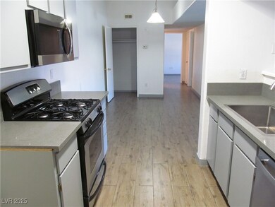 Kitchen featuring appliances with stainless steel
