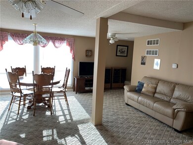 Living area, dining area open to the kitchen and a
