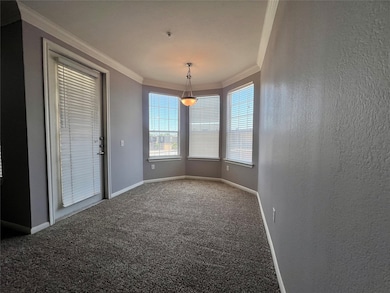 The dining area with a bay window can accommodate