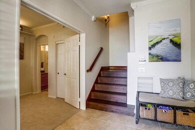 Open the front door to a light entry way and a ful