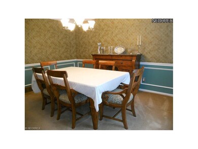Formal Dining Room with Decorative Chair & Crown M