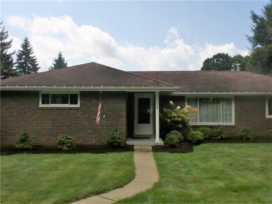 Close up of the front of the home, which is nicely landscaped.