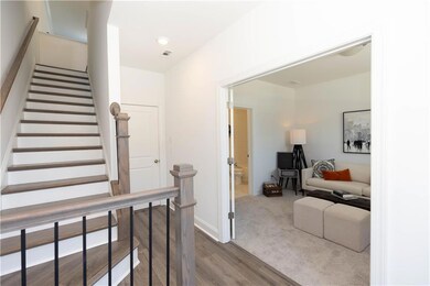 Terrace level foyer with garage entry in the rear of home and Terrace Bedroom in the front *Photos are of stagged home. Photos shown are not actual unit.*