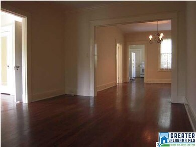 Gleaming hardwood floors throughout the living are