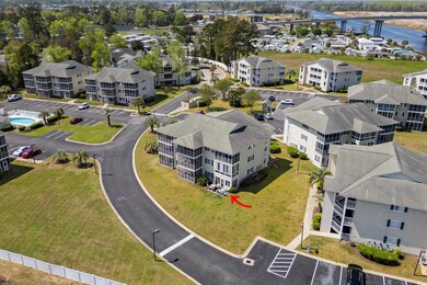 Birds eye view of property with a residential view