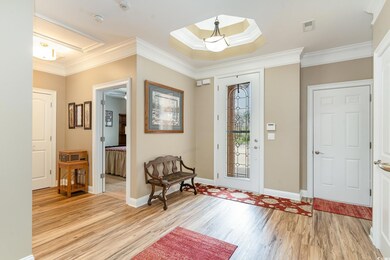 Foyer with light hardwood / wood-style flooring, a