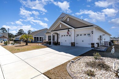 Craftsman inspired home featuring an attached gara